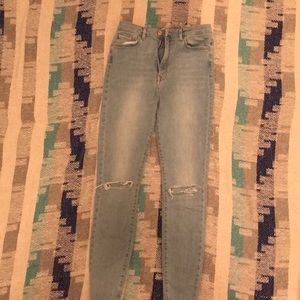 High waisted skinny jeans w/ ripped knees